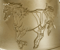 image reprise en relief sur une cloche en bronze Paccard