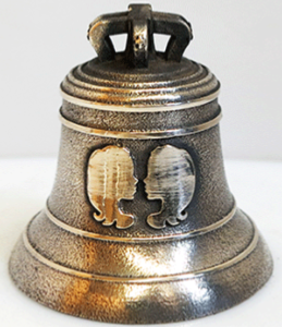 Bronze bell object of an original personalized gift for a birthday