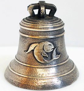 Bronze bell object of an original personalized gift for a birthday